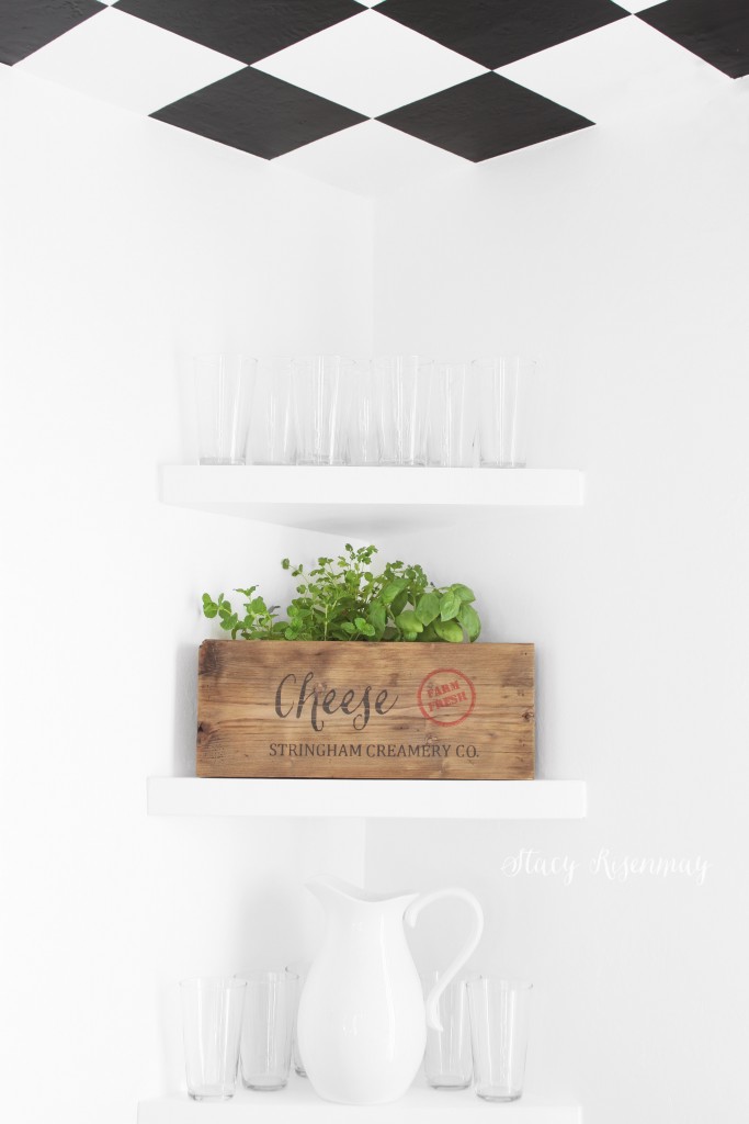 kitchen shelves with herbs in wooden cheese crate