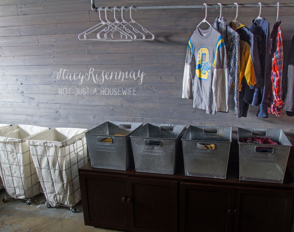laundry room organized with metal bins